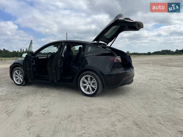 Черный Тесла Model Y, объемом двигателя 0 л и пробегом 83 тыс. км за 25500 $, фото 19 на Automoto.ua
