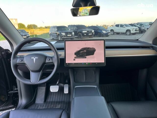 Черный Тесла Model Y, объемом двигателя 0 л и пробегом 73 тыс. км за 27890 $, фото 29 на Automoto.ua