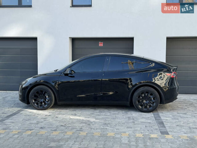 Черный Тесла Model Y, объемом двигателя 0 л и пробегом 48 тыс. км за 28999 $, фото 13 на Automoto.ua
