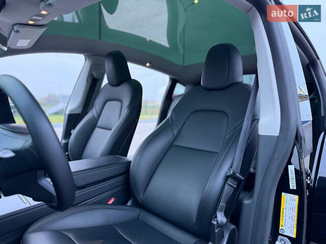 Черный Тесла Model Y, объемом двигателя 0 л и пробегом 53 тыс. км за 34999 $, фото 15 на Automoto.ua
