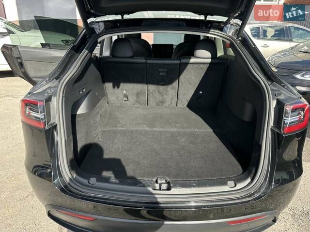 Черный Тесла Model Y, объемом двигателя 0 л и пробегом 49 тыс. км за 27555 $, фото 18 на Automoto.ua