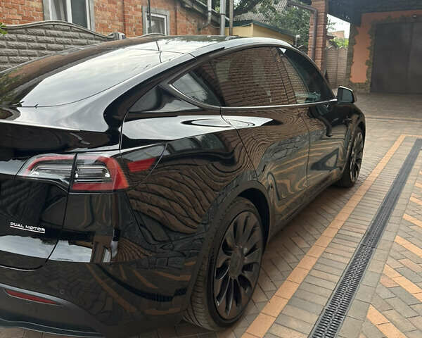 Черный Тесла Model Y, объемом двигателя 0 л и пробегом 56 тыс. км за 27000 $, фото 2 на Automoto.ua