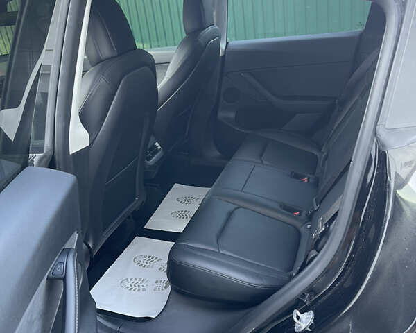 Черный Тесла Model Y, объемом двигателя 0 л и пробегом 67 тыс. км за 27500 $, фото 30 на Automoto.ua