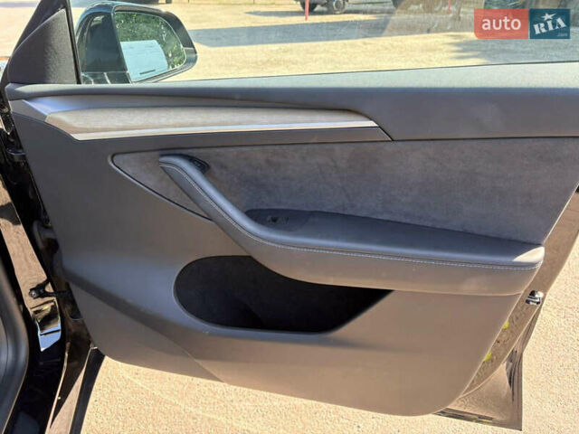 Тесла Model Y 2022 в Ровно на Automoto.ua Черный Тесла Model Y, объемом двигателя 0 л и пробегом 51 тыс. км за 23699 $, фото 20 на Automoto.ua