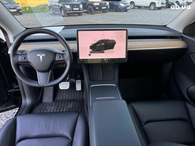 Черный Тесла Model Y, объемом двигателя 0 л и пробегом 73 тыс. км за 27890 $, фото 27 на Automoto.ua