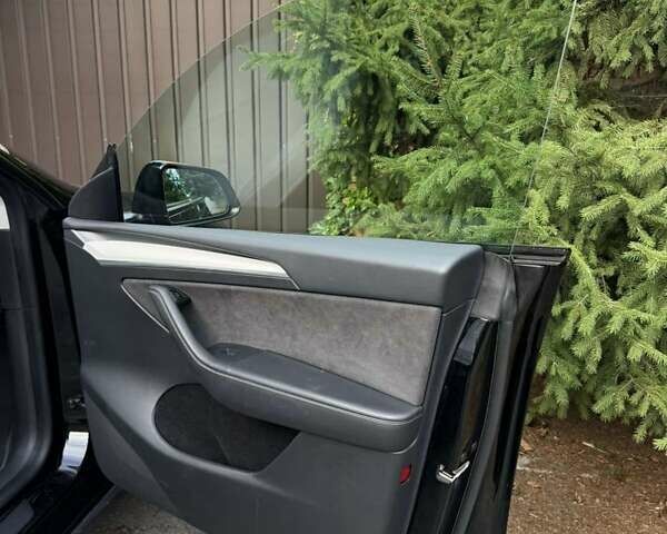 Черный Тесла Model Y, объемом двигателя 0 л и пробегом 90 тыс. км за 32000 $, фото 20 на Automoto.ua