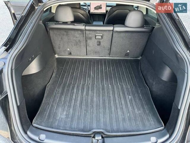 Черный Тесла Model Y, объемом двигателя 0 л и пробегом 73 тыс. км за 27890 $, фото 34 на Automoto.ua