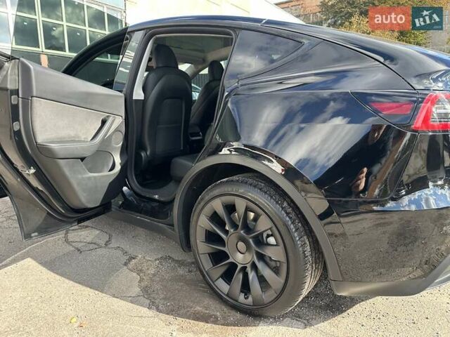 Черный Тесла Model Y, объемом двигателя 0 л и пробегом 49 тыс. км за 27555 $, фото 16 на Automoto.ua