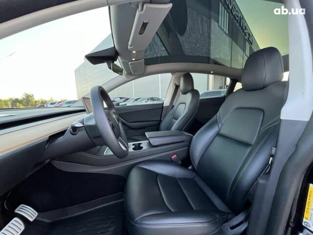 Черный Тесла Model Y, объемом двигателя 0 л и пробегом 73 тыс. км за 27890 $, фото 15 на Automoto.ua