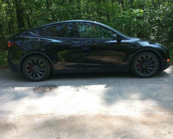 Черный Тесла Model Y, объемом двигателя 0 л и пробегом 90 тыс. км за 29000 $, фото 1 на Automoto.ua