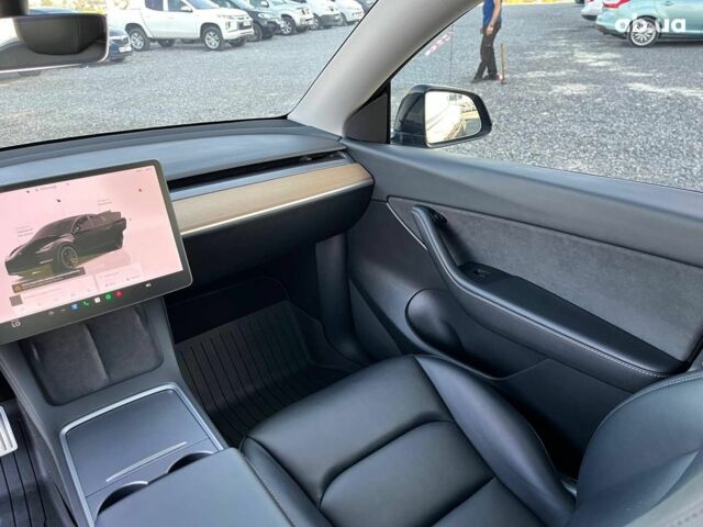 Черный Тесла Model Y, объемом двигателя 0 л и пробегом 73 тыс. км за 27890 $, фото 30 на Automoto.ua