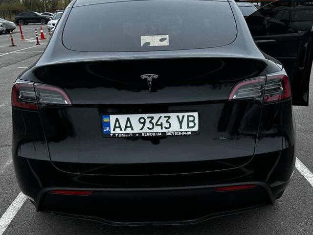 Черный Тесла Model Y, объемом двигателя 0 л и пробегом 46 тыс. км за 34000 $, фото 1 на Automoto.ua