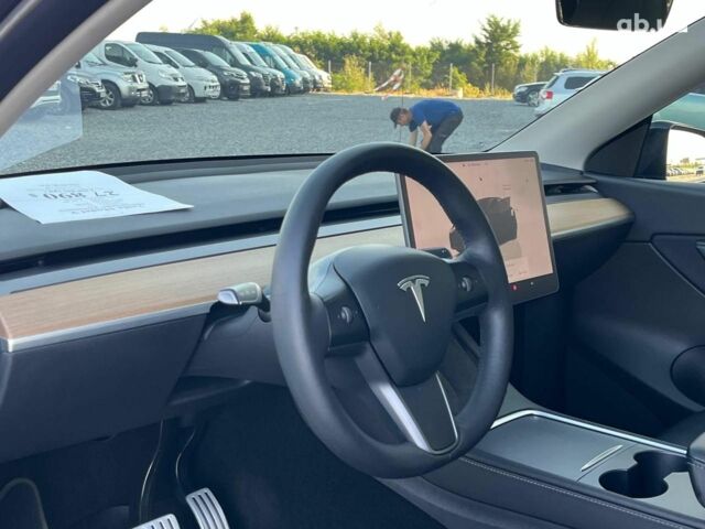 Черный Тесла Model Y, объемом двигателя 0 л и пробегом 73 тыс. км за 27890 $, фото 13 на Automoto.ua