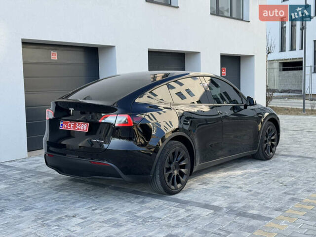 Черный Тесла Model Y, объемом двигателя 0 л и пробегом 48 тыс. км за 28999 $, фото 5 на Automoto.ua