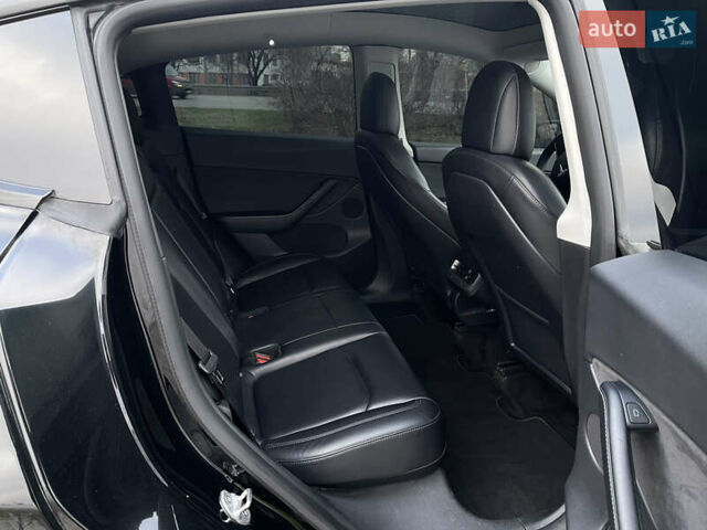 Чорний Тесла Model Y, об'ємом двигуна 0 л та пробігом 88 тис. км за 29999 $, фото 16 на Automoto.ua