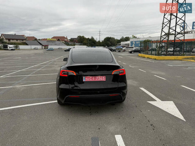 Черный Тесла Model Y, объемом двигателя 0 л и пробегом 65 тыс. км за 27000 $, фото 4 на Automoto.ua