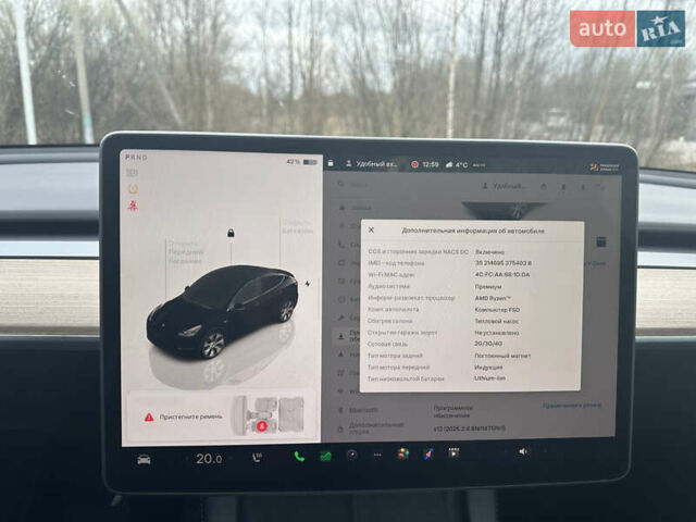 Черный Тесла Model Y, объемом двигателя 0 л и пробегом 24 тыс. км за 27999 $, фото 7 на Automoto.ua