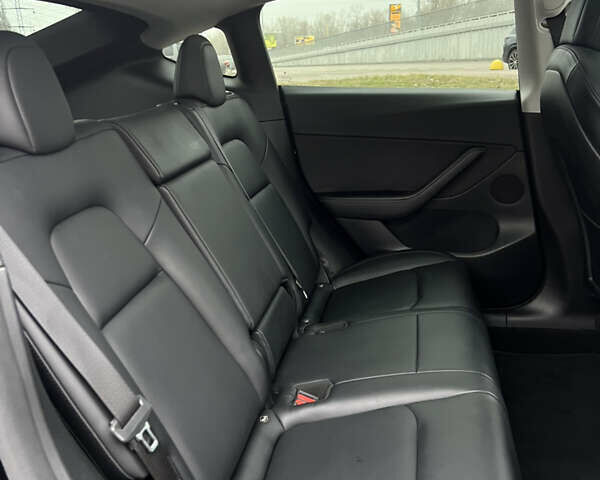 Черный Тесла Model Y, объемом двигателя 0 л и пробегом 61 тыс. км за 22900 $, фото 35 на Automoto.ua