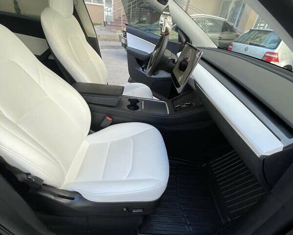Черный Тесла Model Y, объемом двигателя 0 л и пробегом 81 тыс. км за 27700 $, фото 16 на Automoto.ua