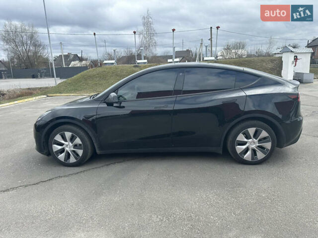 Черный Тесла Model Y, объемом двигателя 0 л и пробегом 24 тыс. км за 27999 $, фото 4 на Automoto.ua