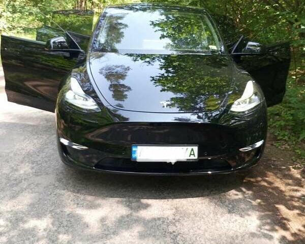 Черный Тесла Model Y, объемом двигателя 0 л и пробегом 90 тыс. км за 29000 $, фото 2 на Automoto.ua