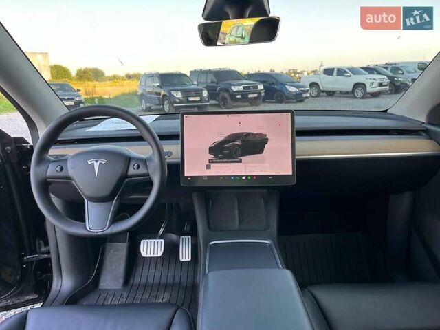 Черный Тесла Model Y, объемом двигателя 0 л и пробегом 73 тыс. км за 27890 $, фото 29 на Automoto.ua