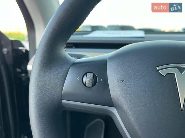 Черный Тесла Model Y, объемом двигателя 0 л и пробегом 73 тыс. км за 27890 $, фото 19 на Automoto.ua