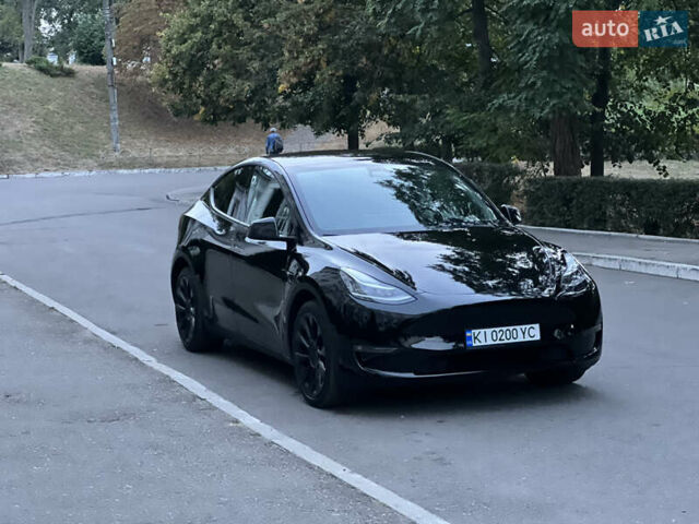 Черный Тесла Model Y, объемом двигателя 0 л и пробегом 77 тыс. км за 28900 $, фото 31 на Automoto.ua