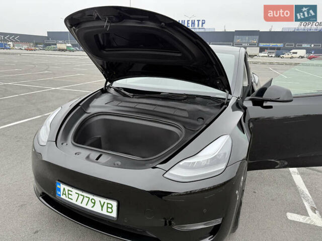 Черный Тесла Model Y, объемом двигателя 0 л и пробегом 22 тыс. км за 27999 $, фото 33 на Automoto.ua