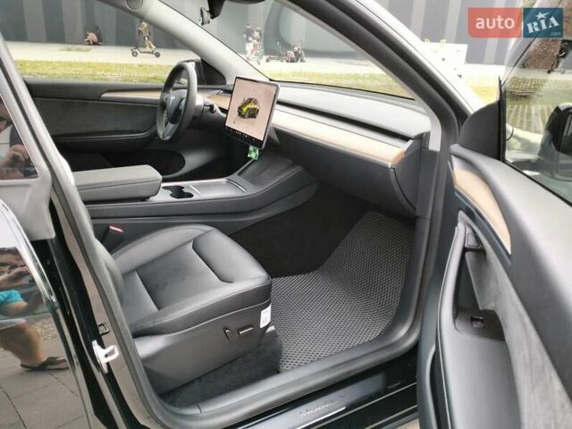 Черный Тесла Model Y, объемом двигателя 0 л и пробегом 23 тыс. км за 30500 $, фото 27 на Automoto.ua