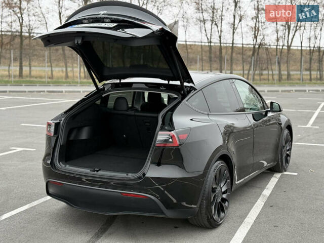 Черный Тесла Model Y, объемом двигателя 0 л и пробегом 22 тыс. км за 27999 $, фото 15 на Automoto.ua