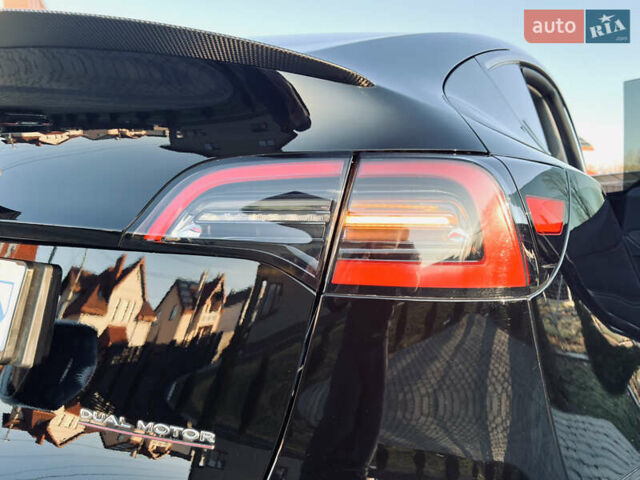 Черный Тесла Model Y, объемом двигателя 0 л и пробегом 100 тыс. км за 28900 $, фото 26 на Automoto.ua