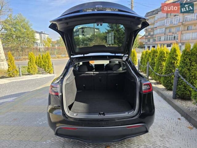 Черный Тесла Model Y, объемом двигателя 0 л и пробегом 27 тыс. км за 28999 $, фото 18 на Automoto.ua