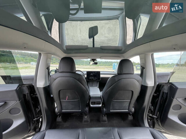 Черный Тесла Model Y, объемом двигателя 0 л и пробегом 83 тыс. км за 25500 $, фото 20 на Automoto.ua