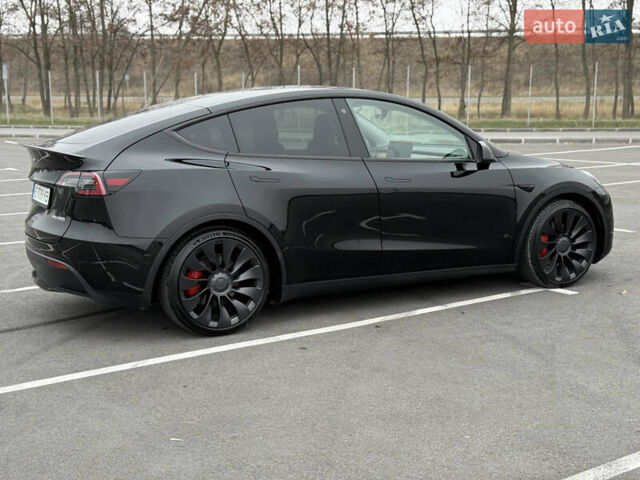 Черный Тесла Model Y, объемом двигателя 0 л и пробегом 22 тыс. км за 27999 $, фото 7 на Automoto.ua