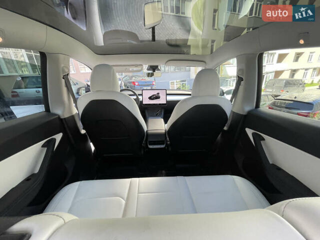 Черный Тесла Model Y, объемом двигателя 0 л и пробегом 81 тыс. км за 27700 $, фото 18 на Automoto.ua