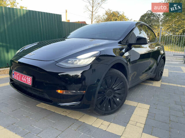 Черный Тесла Model Y, объемом двигателя 0 л и пробегом 65 тыс. км за 25500 $, фото 1 на Automoto.ua