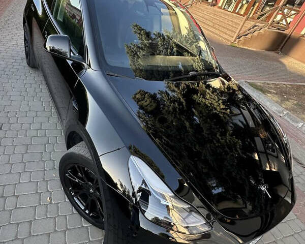Черный Тесла Model Y, объемом двигателя 0 л и пробегом 56 тыс. км за 26800 $, фото 2 на Automoto.ua