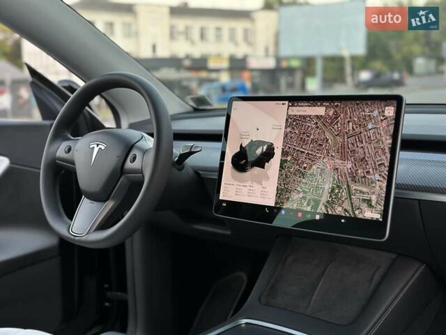 Черный Тесла Model Y, объемом двигателя 0 л и пробегом 135 тыс. км за 26899 $, фото 38 на Automoto.ua