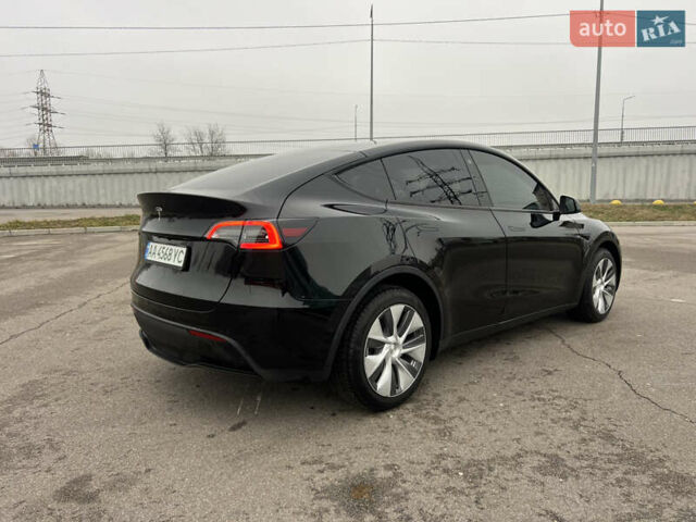Черный Тесла Model Y, объемом двигателя 0 л и пробегом 61 тыс. км за 22900 $, фото 1 на Automoto.ua