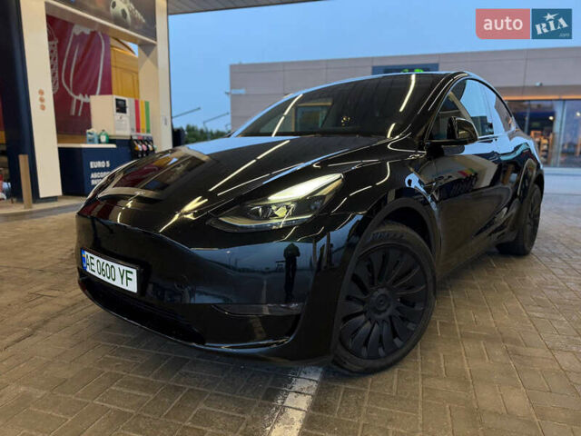 Черный Тесла Model Y, объемом двигателя 0 л и пробегом 53 тыс. км за 34999 $, фото 2 на Automoto.ua
