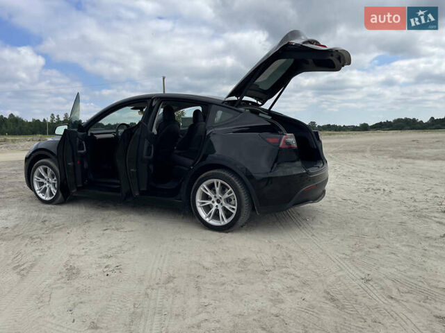 Черный Тесла Model Y, объемом двигателя 0 л и пробегом 83 тыс. км за 25500 $, фото 18 на Automoto.ua