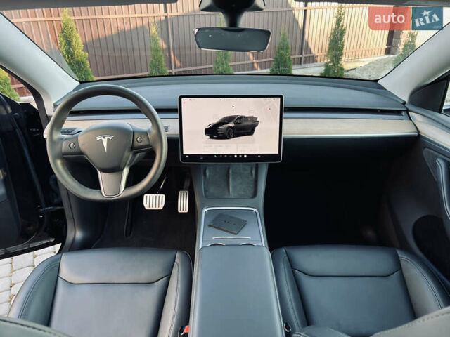 Черный Тесла Model Y, объемом двигателя 0 л и пробегом 100 тыс. км за 28900 $, фото 34 на Automoto.ua