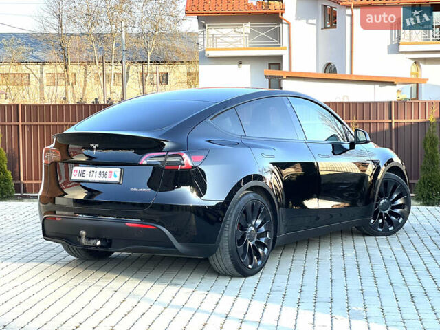 Черный Тесла Model Y, объемом двигателя 0 л и пробегом 100 тыс. км за 28900 $, фото 22 на Automoto.ua