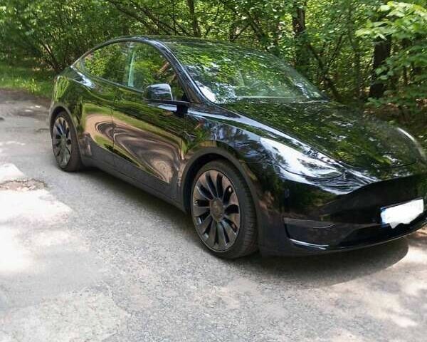 Черный Тесла Model Y, объемом двигателя 0 л и пробегом 90 тыс. км за 29000 $, фото 5 на Automoto.ua