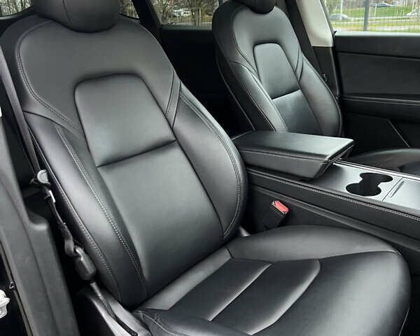 Черный Тесла Model Y, объемом двигателя 0 л и пробегом 61 тыс. км за 22900 $, фото 19 на Automoto.ua