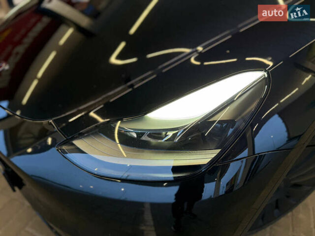 Черный Тесла Model Y, объемом двигателя 0 л и пробегом 53 тыс. км за 34999 $, фото 3 на Automoto.ua