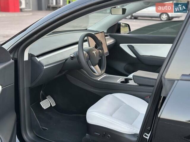 Черный Тесла Model Y, объемом двигателя 0 л и пробегом 135 тыс. км за 26899 $, фото 28 на Automoto.ua