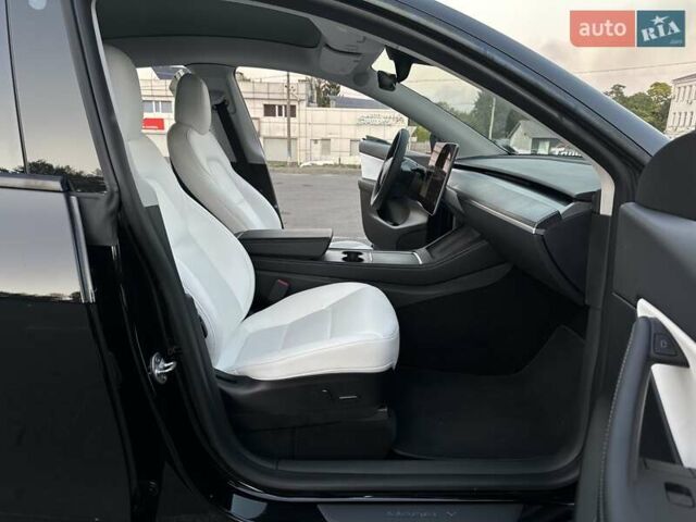 Черный Тесла Model Y, объемом двигателя 0 л и пробегом 135 тыс. км за 26899 $, фото 34 на Automoto.ua