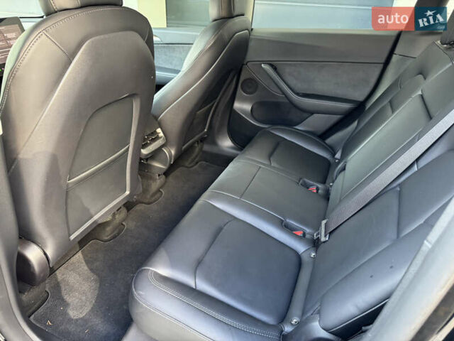 Черный Тесла Model Y, объемом двигателя 0 л и пробегом 48 тыс. км за 28999 $, фото 24 на Automoto.ua